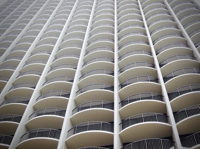 Hotel room balconies in Honolulu's famous Waikiki district. (2014, color graded)