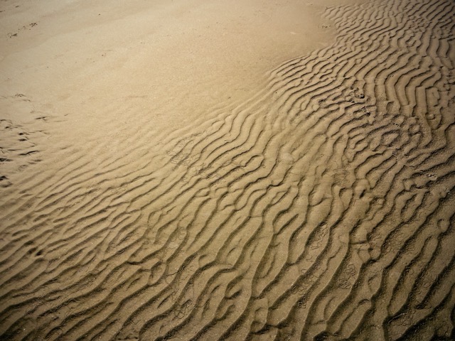 Channels carved by the water in the firm sand of Wells Beach, ME. (2015, color graded)