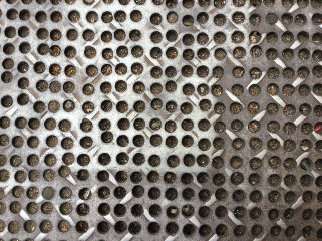 A irregularly-drilled storm drain on the streets of Boston, MA. (2017)