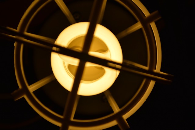 A work lamp in a plastic cage.  Taken for a college course, part of a series of explorations on a single concept. (2017)