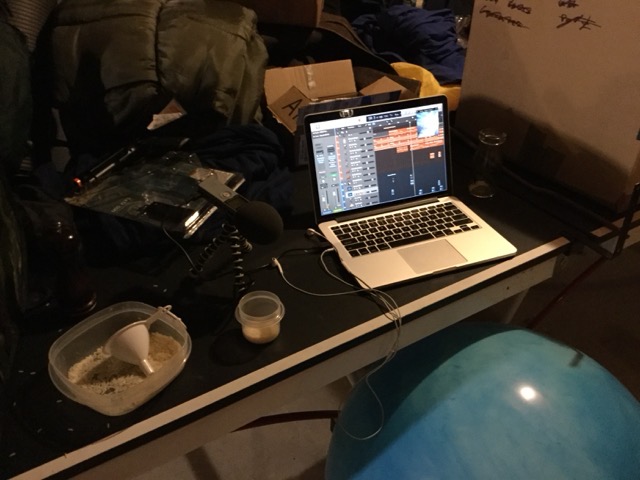 One of the sound effects came from running a pen through a tray of rice, then applying a heavy reverb.  Listen carefully and you'll hear it.