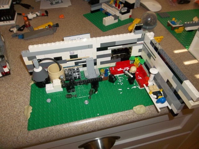 We used bits of paper to portray broken glass.  In hindsight, we probably should have sliced up a Ziploc bag instead.