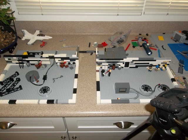 A lightsaber duel spanning two rooftops.