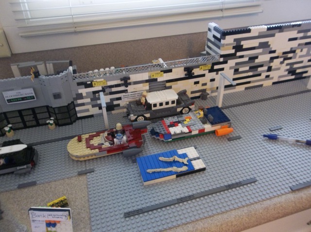 The streets of the city.  Yes, someone really did build a bank right next to the jail.