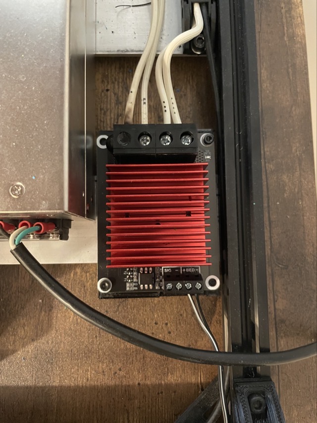 A loose wire connection caused the power module controlling the bed to overheat and melt its plastic housing. (2023)