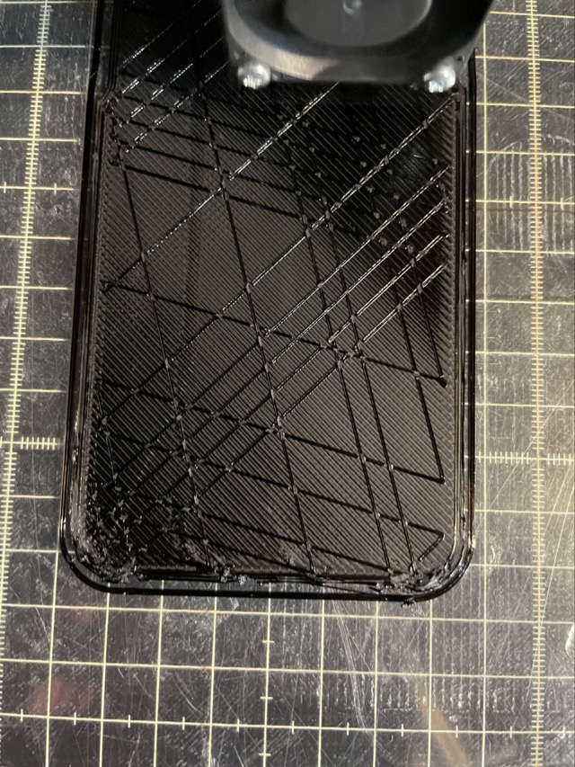 Partway through attempting to print the infill of a phone case.  This partial pattern looked really cool. (2021)