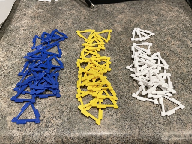 The 60 individual pieces needed to assemble a stellated icosahedron. (2022)