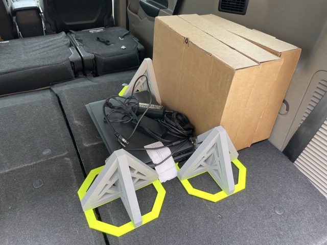 A two-piece model designed to grip and hold cargo securely on vehicle carpeting. (2024)